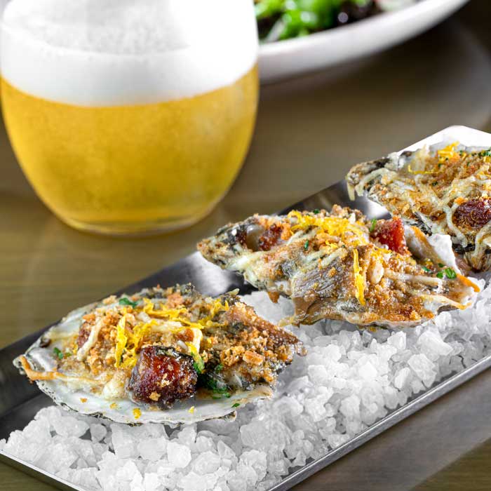 carson kitchen grilled oysters rockefeller credit chris wessling